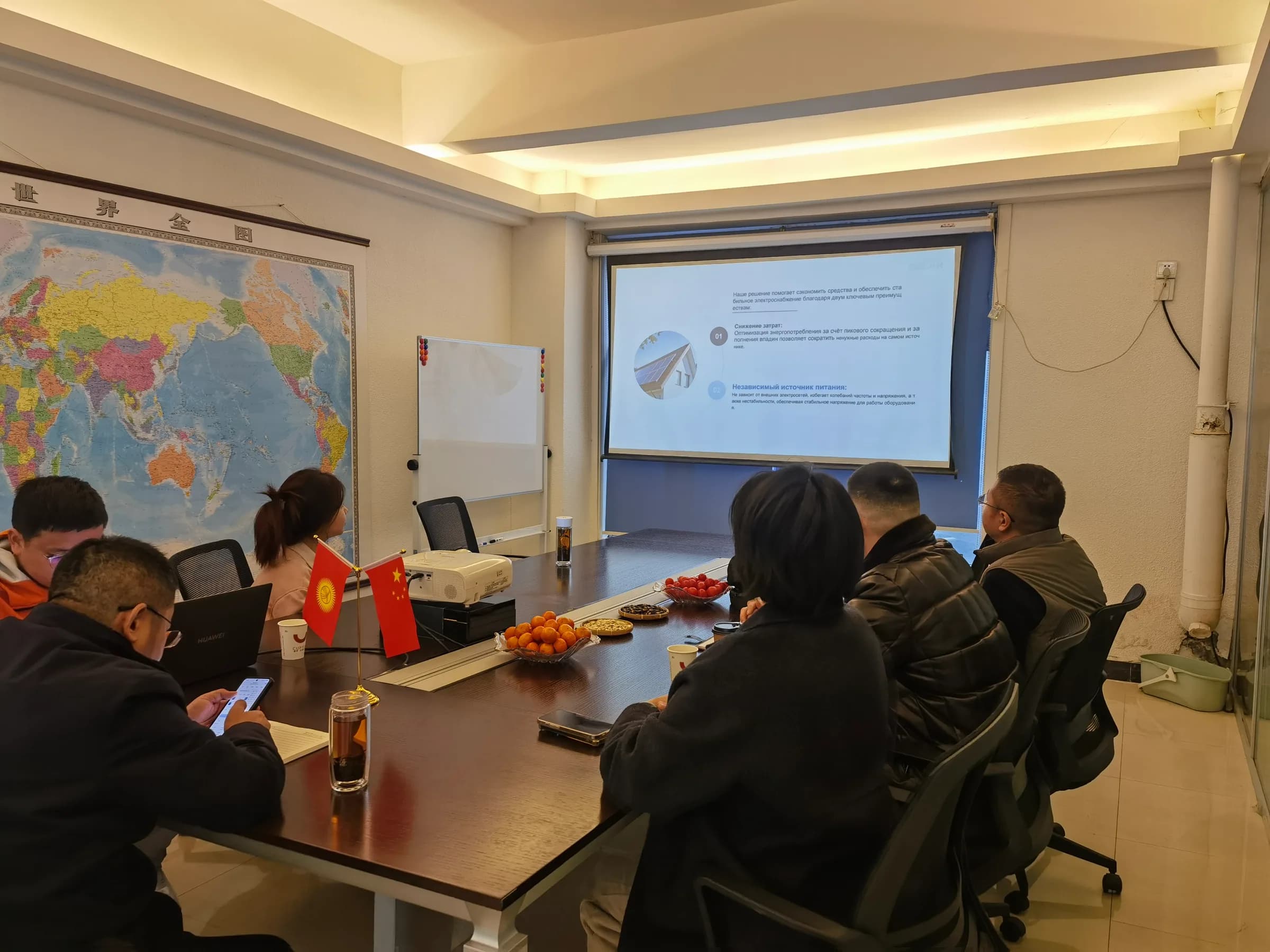 Rongkai Solar team leading a technical training session for partners in the office.